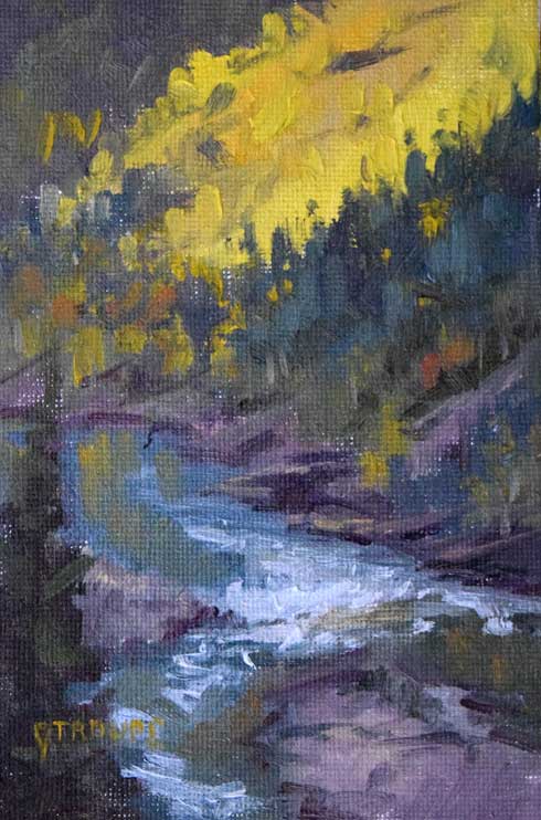 Montana plein air painter painting lit up above